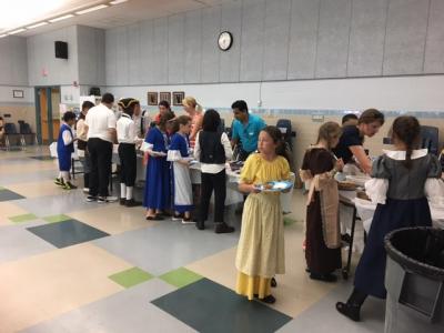 photo of students dressed in colonial costumes